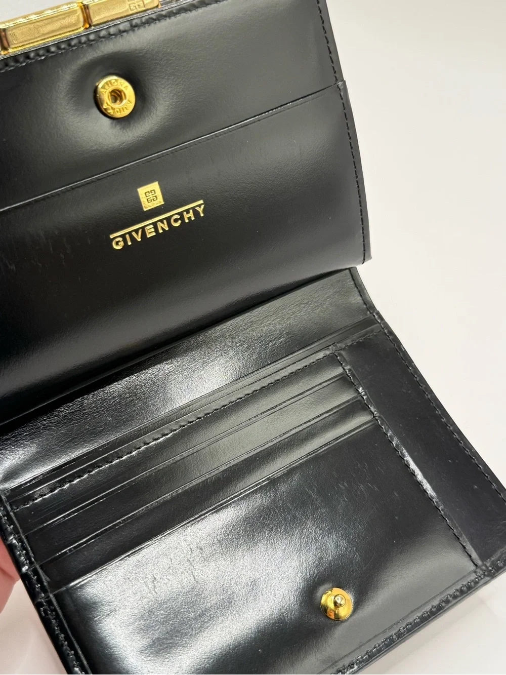 Vintage Givenchy 4G Monogram Black Leather Logo-Pattern Compact Wallet Pre-Owned